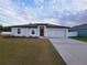 Image 1 of 15: 399 Begonia Ct, Poinciana