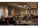 Elegant meeting room with round tables and modern lighting at 14501 Grove Resort Ave # 2740, Winter Garden, FL 34787