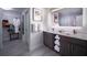 Modern bathroom with double vanity and walk-in closet at 14501 Grove Resort Ave # 2740, Winter Garden, FL 34787