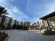 Condo building with fountain and ample parking at 14501 Grove Resort Ave # 2740, Winter Garden, FL 34787
