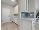 White cabinets and light gray quartz countertop at 4413 Lions Gate Ave, Clermont, FL 34711