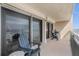 Private balcony with ocean view and outdoor seating at 4445 S Atlantic Ave # 606, Ponce Inlet, FL 32127