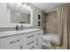 Bathroom with tub, toilet and a modern vanity at 4445 S Atlantic Ave # 606, Ponce Inlet, FL 32127