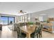 Bright dining room with wood table and ocean view at 4445 S Atlantic Ave # 606, Ponce Inlet, FL 32127