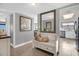 Entryway with bench and view into kitchen and living areas at 4445 S Atlantic Ave # 606, Ponce Inlet, FL 32127