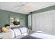 Bedroom with two twin beds and built-in closet at 4445 S Atlantic Ave # 606, Ponce Inlet, FL 32127