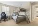 Bedroom with a bunk bed, desk, and window at 2881 Kokomo Loop, Haines City, FL 33844