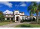 Stunning two-story home with tile roof and manicured lawn at 11617 Waterstone Loop Dr, Windermere, FL 34786