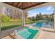 Relaxing pool and spa with covered patio at 11617 Waterstone Loop Dr, Windermere, FL 34786