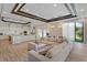 Modern kitchen with large island, white cabinetry, and mosaic backsplash at 11617 Waterstone Loop Dr, Windermere, FL 34786