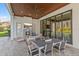 Outdoor kitchen with stainless steel grill and fire pit at 11617 Waterstone Loop Dr, Windermere, FL 34786