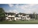 Luxury homes with modern design, lush landscaping, and beautiful backyard views at 4174 Grande Brick Loop # 25, Orlando, FL 32837