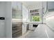 Modern community kitchen with stainless steel appliances and sleek countertops at 4174 Grande Brick Loop # 25, Orlando, FL 32837