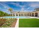 Inviting pool area with lush landscaping and a spacious deck at 4174 Grande Brick Loop # 25, Orlando, FL 32837