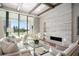 Bright living room features a stunning marble fireplace at 4174 Grande Brick Loop # 25, Orlando, FL 32837