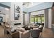 Bright and airy living room with a fireplace and access to the pool at 4007 Grande Brick Loop # 13, Orlando, FL 32837