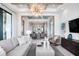Open concept living room with views into the dining room and kitchen at 4007 Grande Brick Loop # 13, Orlando, FL 32837
