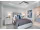 Serene guest bedroom with ensuite bathroom and coastal decor at 4007 Grande Brick Loop # 13, Orlando, FL 32837