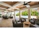 Relaxing outdoor patio with comfortable seating and pool view at 4007 Grande Brick Loop # 13, Orlando, FL 32837
