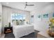 Bright and airy bedroom with large windows and a ceiling fan at 4139 Grande Brick Loop # 15, Orlando, FL 32837