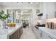 Bright kitchen boasts a marble island and stainless steel appliances at 4139 Grande Brick Loop # 15, Orlando, FL 32837