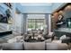 Spacious living room with fireplace and large windows at 4139 Grande Brick Loop # 15, Orlando, FL 32837