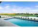 Inviting pool with golf course and lake views at 4139 Grande Brick Loop # 15, Orlando, FL 32837