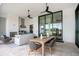 Spacious outdoor kitchen with fireplace and seating at 4139 Grande Brick Loop # 15, Orlando, FL 32837