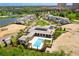 Aerial view of community pool and clubhouse at 4168 Grande Brick Loop # 26, Orlando, FL 32837