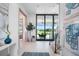 Entryway with view to golf course, showcasing sliding glass doors and modern decor at 4163 Grande Brick Loop # 19, Orlando, FL 32837