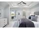 Bright bedroom with plush bedding and access to a private patio at 4163 Grande Brick Loop # 19, Orlando, FL 32837