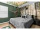 Dinosaur themed bedroom with a mural and large bed at 1909 Tropical Palms Cir, Kissimmee, FL 34747