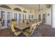 Spacious covered patio with seating and dining area at 6443 Cartmel Ln, Windermere, FL 34786