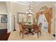 Elegant dining room with a formal table and chairs, perfect for entertaining at 6443 Cartmel Ln, Windermere, FL 34786