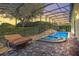Relaxing pool and spa area with patio furniture at 6443 Cartmel Ln, Windermere, FL 34786