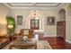Bright living room with hardwood floors and comfortable seating at 6443 Cartmel Ln, Windermere, FL 34786
