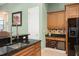 Functional kitchen with a wine rack and ample storage space at 6443 Cartmel Ln, Windermere, FL 34786