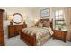 Charming bedroom with wood bed and dresser at 6443 Cartmel Ln, Windermere, FL 34786