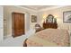 Primary bedroom with large wardrobe and comfortable seating at 6443 Cartmel Ln, Windermere, FL 34786