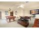 Game room with pool table, seating area, and game table at 6443 Cartmel Ln, Windermere, FL 34786