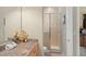 Guest bathroom with shower and granite countertop at 6443 Cartmel Ln, Windermere, FL 34786