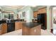 Modern kitchen with stainless steel appliances and granite countertops at 6443 Cartmel Ln, Windermere, FL 34786
