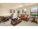 Game room with a seating area, game table and TV at 6443 Cartmel Ln, Windermere, FL 34786