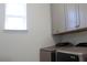 Laundry room with washer, dryer, and cabinets at 728 Costa Ln, Debary, FL 32713