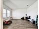 Bright office space with wood-look floors and plenty of natural light at 728 Costa Ln, Debary, FL 32713