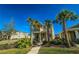 Two-story home with balcony and tropical landscaping at 728 Costa Ln, Debary, FL 32713