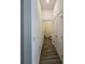 Clean and bright hallway with wood-look flooring and access to other rooms at 728 Costa Ln, Debary, FL 32713