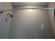 Clean shower stall with white subway tiles and a modern shower head at 728 Costa Ln, Debary, FL 32713