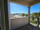Balcony view overlooking a lake and community at 728 Costa Ln, Debary, FL 32713