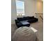 Spacious loft area with a sectional sofa and bean bag chair at 728 Costa Ln, Debary, FL 32713
